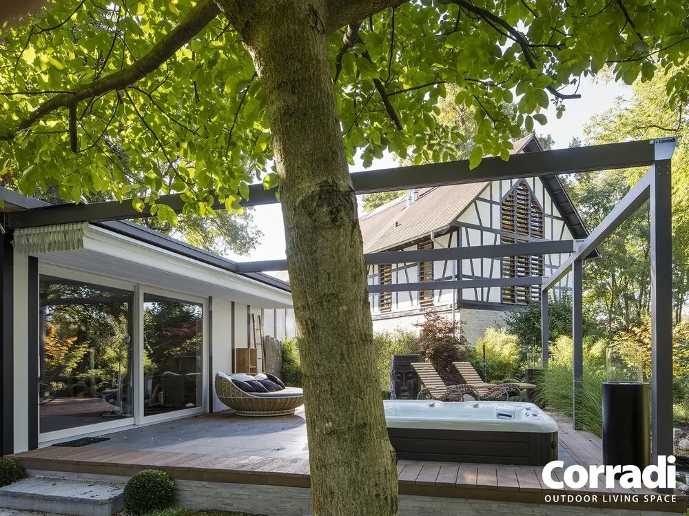 Pergotenda ® B-Space pergola addossata in piano con copertura in telo lasco impermeabile